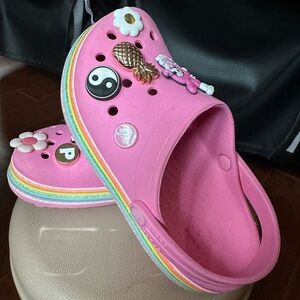 Crocs with glittery rainbow design